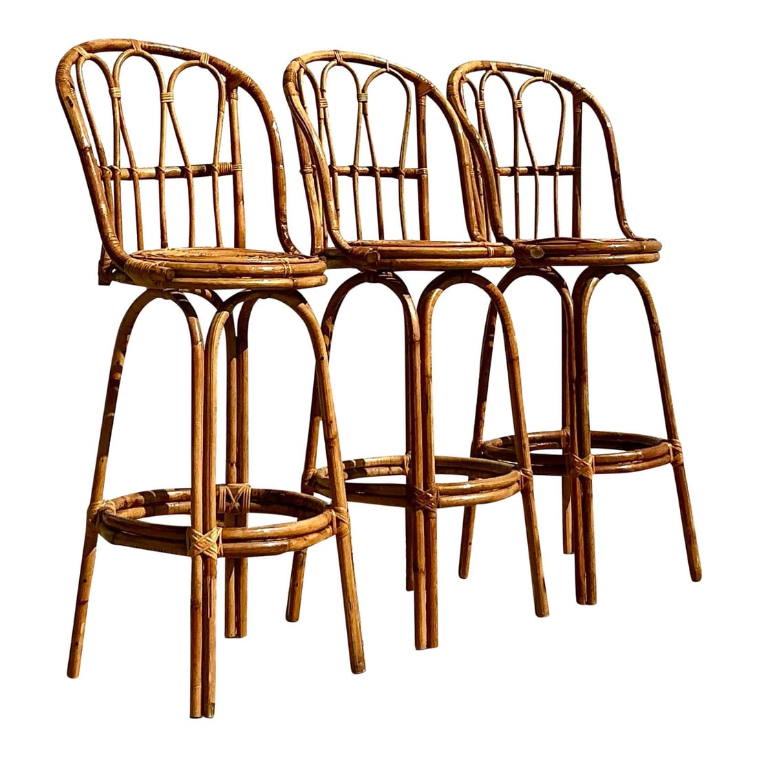 Set of 3 Vintage Coastal Rattan Bar Stools - Elegant Bohemian Design: Set of 3 Vintage Coastal Rattan Bar Stools - Elegant Bohemian Design Enhance your home decor with this exquisite set of three vintage coastal bent rattan bar stools. Featuring a gracefully curved ratt