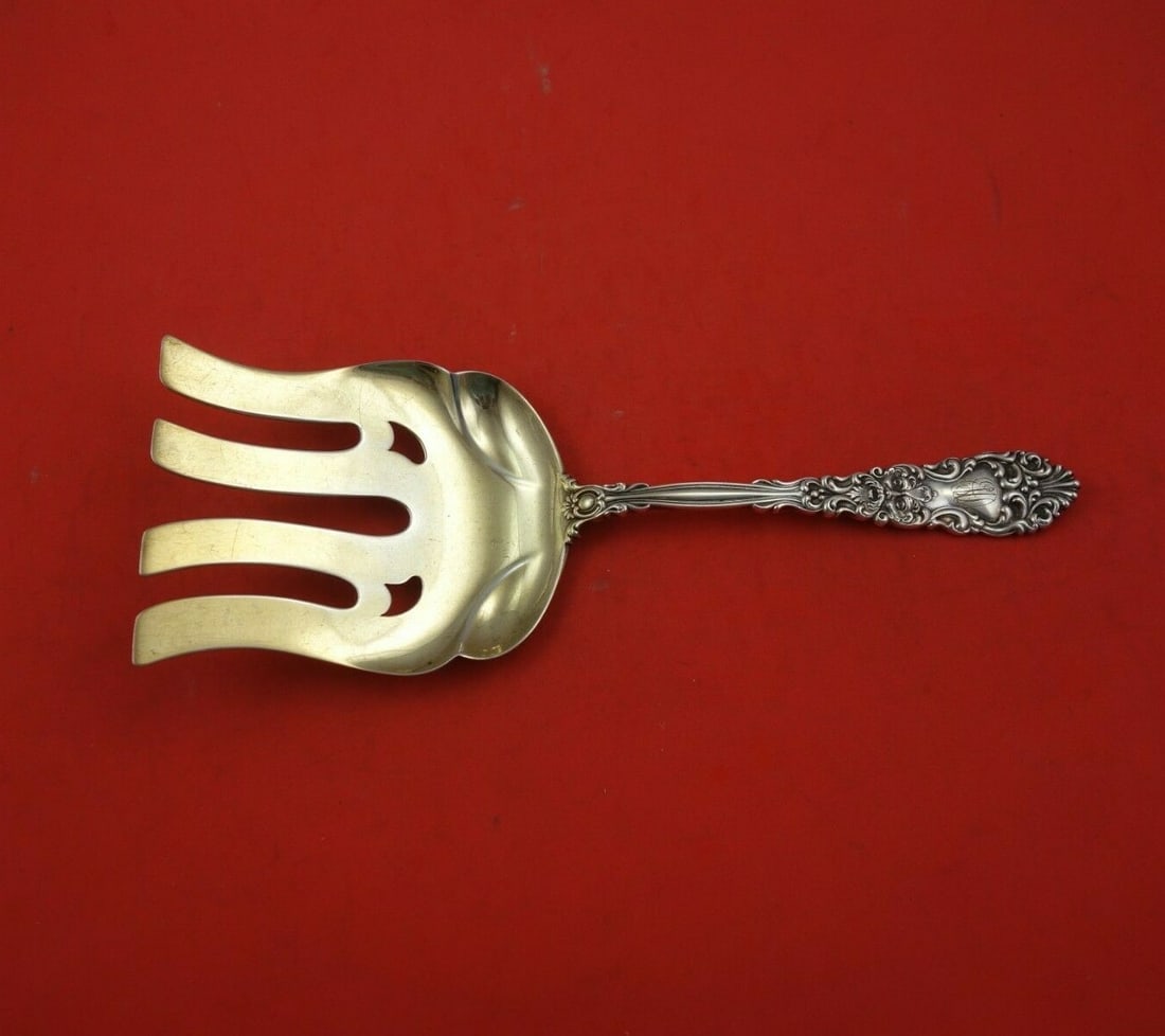 Dominick & Haff Renaissance Sterling Silver Asparagus Fork Gold Washed 9 3/4": Dominick & Haff Renaissance Sterling Silver Asparagus Fork Gold Washed 9 3/4" This exquisite asparagus fork is part of the Renaissance pattern by Dominick & Haff, crafted from sterling silver. Measuri