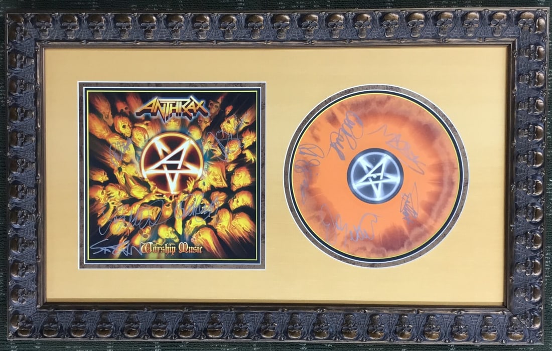 ANTHRAX Signed Album Cover and Record Custom Framed 10 Signatures: ANTHRAX Signed Album Cover and Record Custom Framed 10 Signatures This striking custom framed display features a signed album cover and record from the iconic metal band ANTHRAX. The album cover, meas