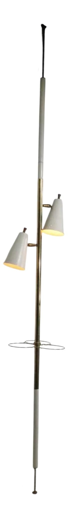 Vintage Mid Century Tension Pole Lamp with Adjustable Lights and Plant Rings: Vintage Mid Century Tension Pole Lamp with Adjustable Lights and Plant Rings This classic Mid Century tension pole lamp features two adjustable cone lights and three rings designed to hold potted plan