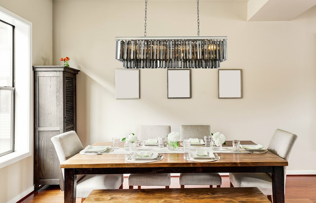 Sydney 12 Light Polished Nickel Crystal Chandelier 50 Inch Modern Rectangle: Sydney 12 Light Polished Nickel Crystal Chandelier 50 Inch Modern Rectangle This modern 12-light chandelier features a polished nickel frame accented with silver shade crystals. Designed for indoor sp