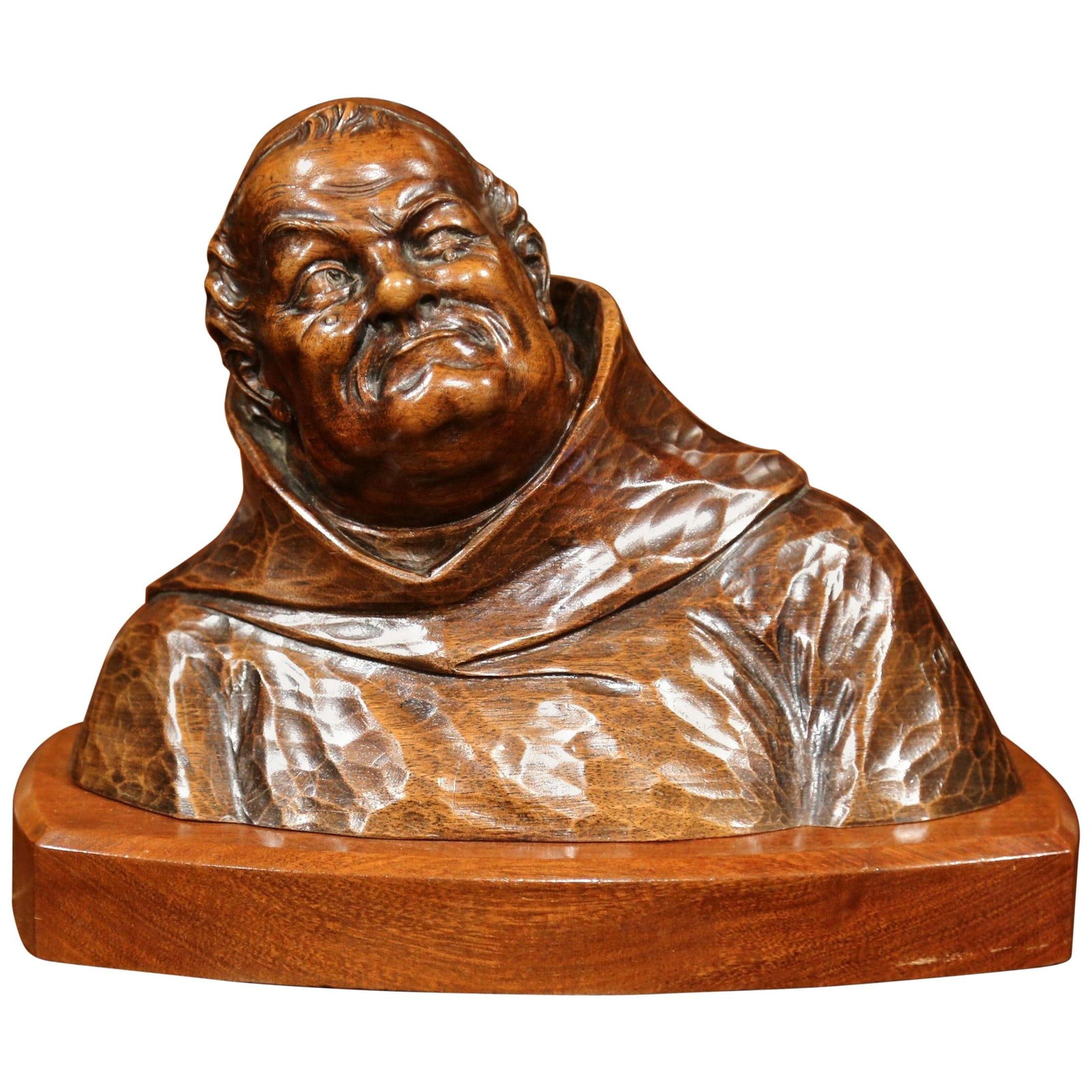 French Walnut Bust of Monk in Cassock Hand Carved circa 1950: French Walnut Bust of Monk in Cassock Hand Carved circa 1950 This hand-carved walnut bust depicts a pensive monk in a cassock and was crafted in France around 1950. The sculpture features intricate de