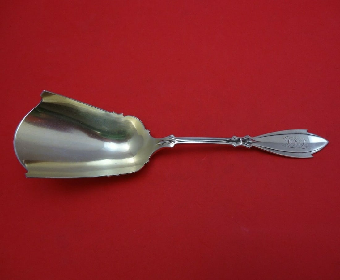 Coles-Shiebler Palace Sterling Silver Gold Washed Cracker Scoop 8 7/8": Coles-Shiebler Palace Sterling Silver Gold Washed Cracker Scoop 8 7/8" This exquisite cracker scoop from the Palace pattern by Coles-Shiebler is crafted from sterling silver and features a stunning go