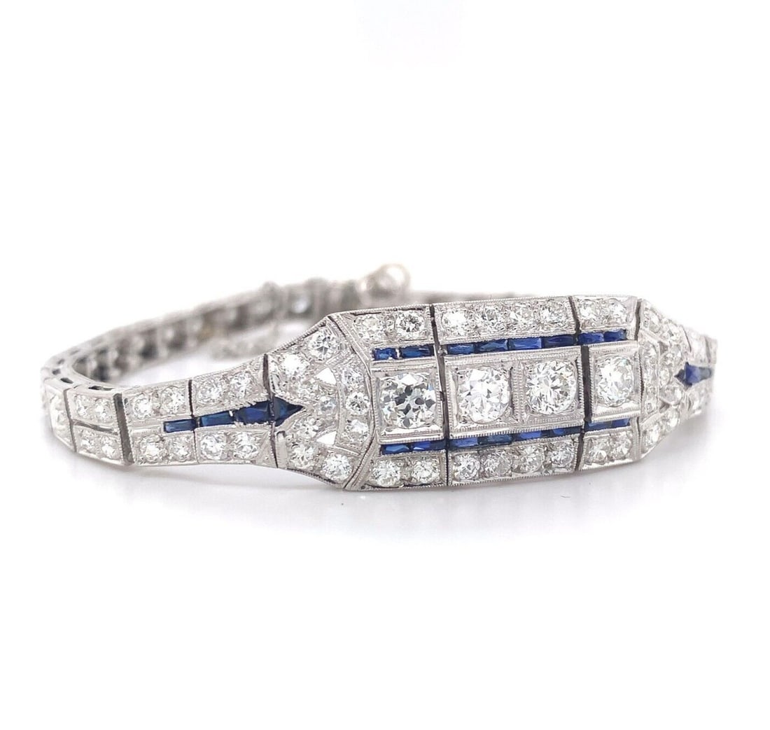 Art Deco Platinum 4.25ct Diamond Bracelet with Lab-Created Blue Sapphires: Art Deco Platinum 4.25ct Diamond Bracelet with Lab-Created Blue Sapphires This exquisite Art Deco bracelet is crafted from platinum and features approximately 4.25 carats total weight of diamonds, com