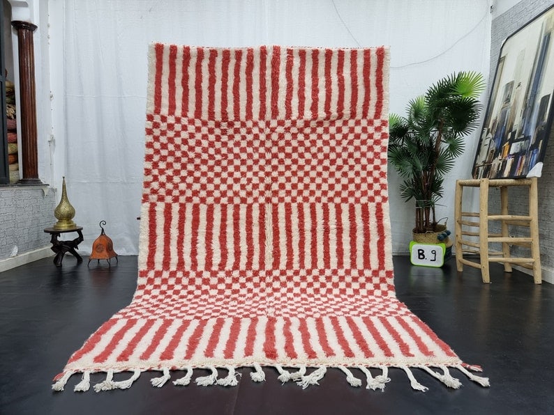 Handmade Moroccan Berber Wool Area Rug 10 x 5 Feet: Handmade Moroccan Berber Wool Area Rug 10 x 5 Feet Enhance your living space with this authentic Soft White Orange Handmade Moroccan Berber Wool Area Rug. Handwoven in the Atlas Mountains by skilled l