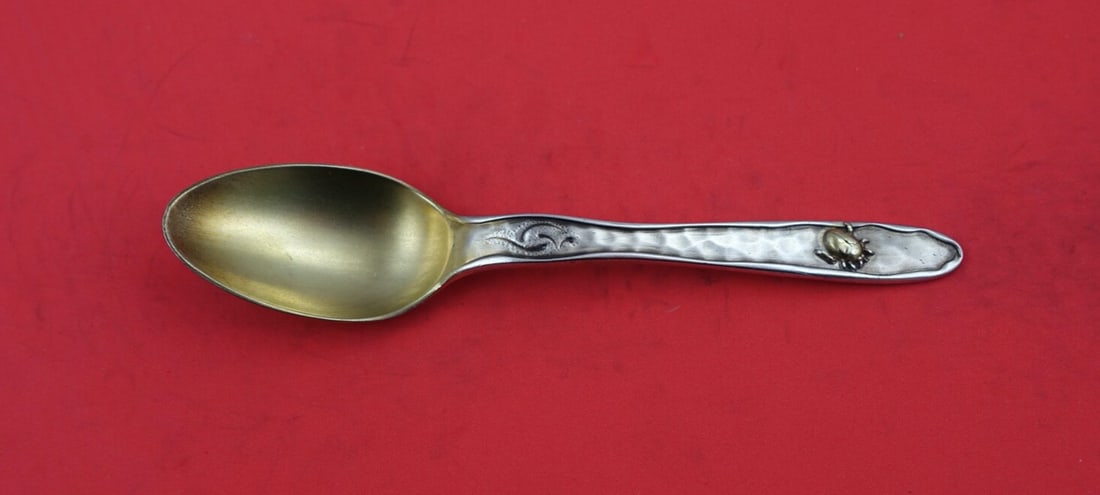 Tiffany & Co Lap Over Edge Sterling Teaspoon with Gold Ladybug 6": Tiffany & Co Lap Over Edge Sterling Teaspoon with Gold Ladybug 6" This exquisite Sterling Silver teaspoon from Tiffany & Co. features the elegant Lap Over Edge Mixed Metals pattern. Measuring 6 inches