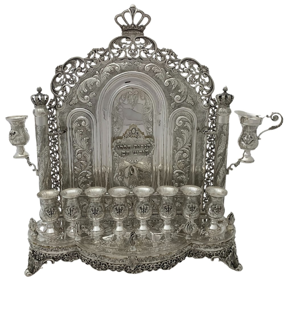 Handmade 925 Sterling Silver Leaf Applique Menorah 19.5 Inches: Handmade 925 Sterling Silver Leaf Applique Menorah 19.5 Inches This exquisite 925 Sterling Silver Menorah is designed for Chanukah and features a stunning handmade leaf applique with chased floral