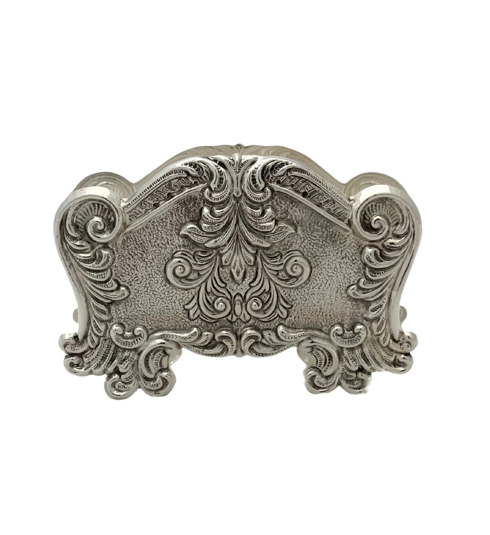 Handmade 925 Sterling Silver Napkin Holder with Chased Leaf Design: Handmade 925 Sterling Silver Napkin Holder with Chased Leaf Design This exquisite napkin holder is crafted from fine 925 sterling silver, showcasing a unique handmade chased leaf applique design. The