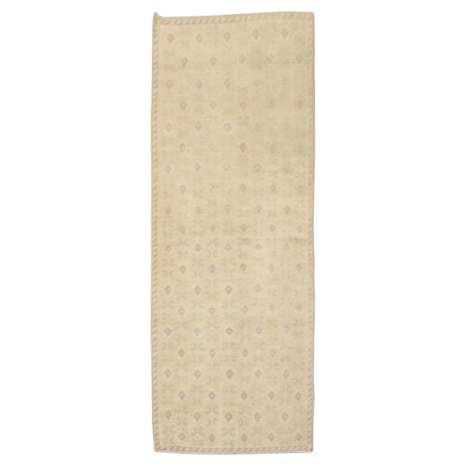 Mid-20th Century Turkish Wool Runner with Green and Beige Floral Accents: Mid-20th Century Turkish Wool Runner with Green and Beige Floral Accents This vintage Turkish runner from the mid-20th century features an all-over floral design with gray and soft green accents on a