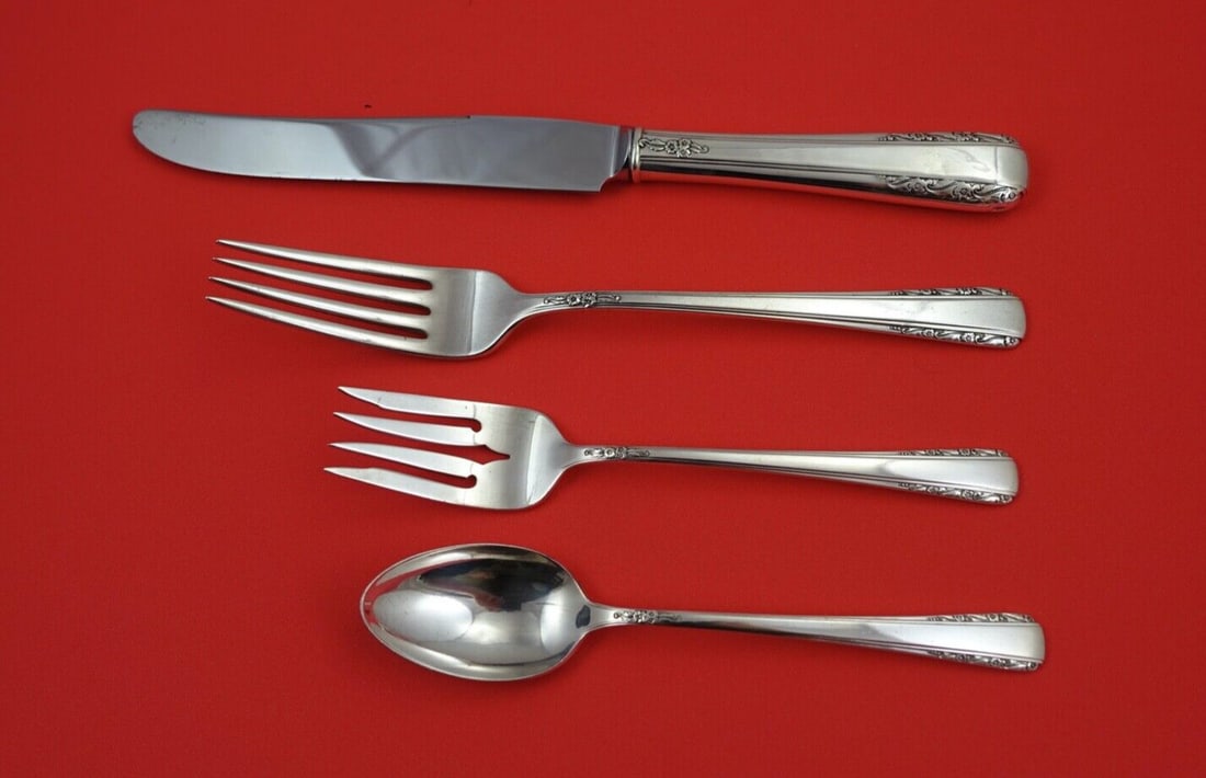 International Sterling Silver Courtship 4-Piece Dinner Set: International Sterling Silver Courtship 4-Piece Dinner Set Enhance your dining experience with this exquisite 4-piece place setting in the Courtship pattern by International. Crafted from high-quality