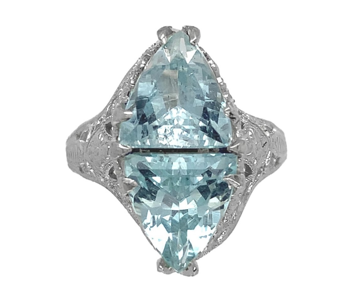 Art Deco 14k White Gold Filigree Ring 2.15ct Aquamarine: Art Deco 14k White Gold Filigree Ring 2.15ct Aquamarine This exquisite Art Deco ring features a stunning design crafted from 14k white gold filigree. The ring showcases two expertly custom-cut triangu