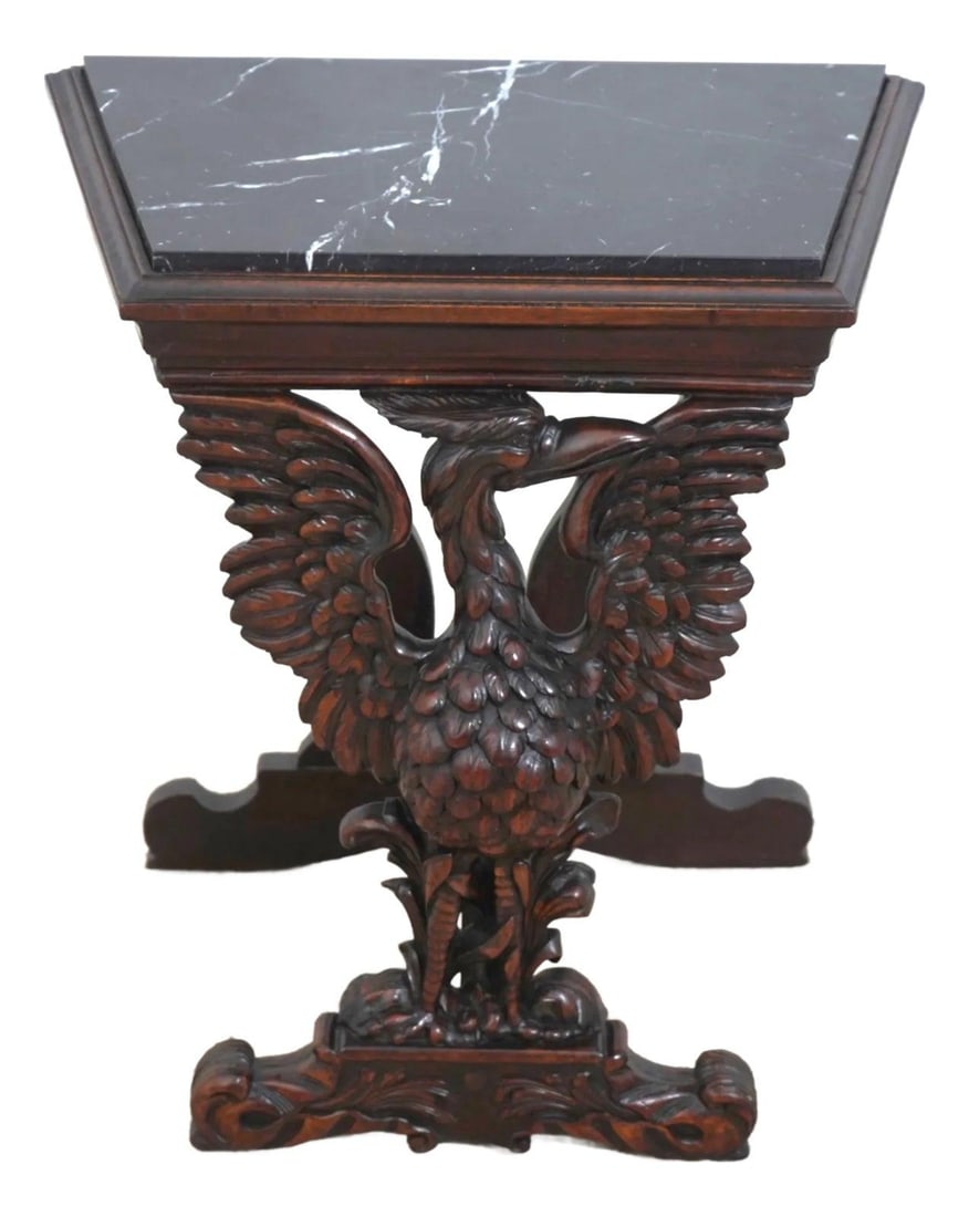 1930s American Carved Walnut Winged Bird Side Table: 1930s American Carved Walnut Winged Bird Side Table This exquisite side table features a stunning winged bird carving on the front, showcasing the craftsmanship of the 1930s. The table is constructed