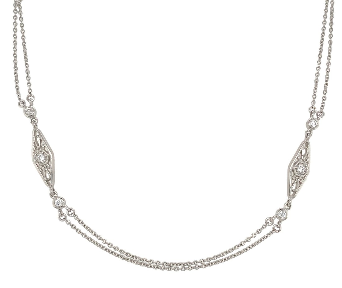 950 Platinum Double Chain Necklace with 16 Diamonds 18 Inch: 950 Platinum Double Chain Necklace with 16 Diamonds 18 Inch This exquisite 950 platinum double chain necklace is crafted in an elegant Art Deco style, featuring genuine diamond filigree links. The nec