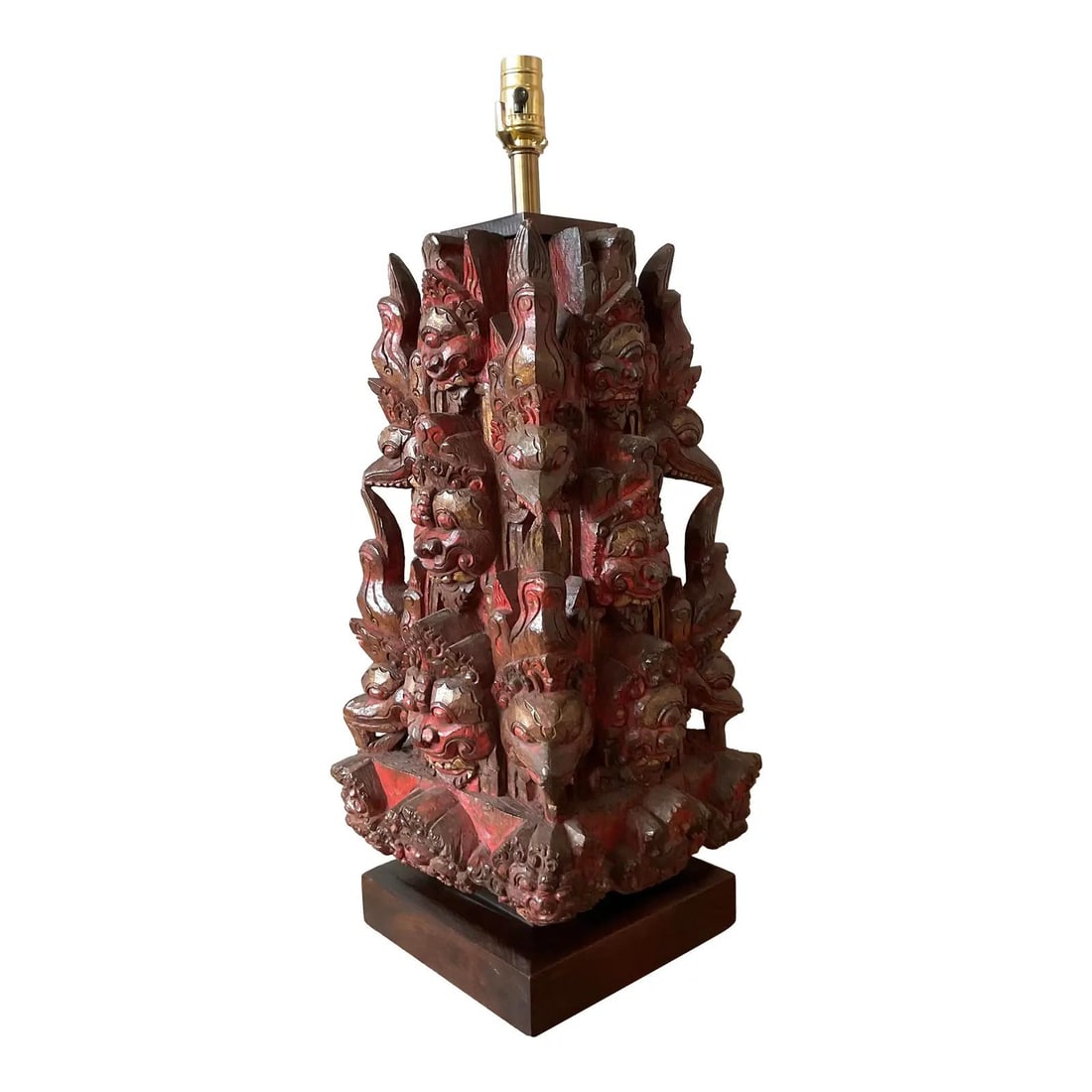 Hand Carved Balinese Temple Mask Wood Table Lamp with Red and Gold Accents: Hand Carved Balinese Temple Mask Wood Table Lamp with Red and Gold Accents This vintage table lamp features a hand-carved wood base inspired by traditional Balinese temple masks, showcasing intricate