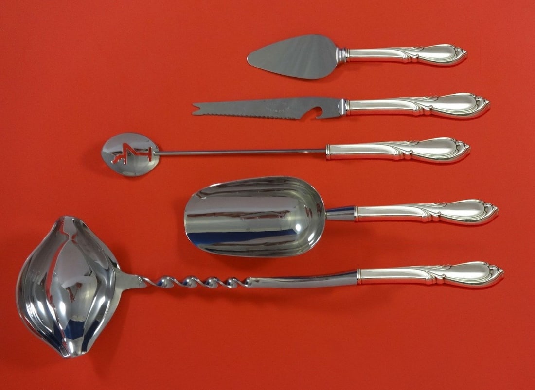 International Sterling Silver Rhapsody 5pc Cocktail Party Bar Set: International Sterling Silver Rhapsody 5pc Cocktail Party Bar Set Elevate your entertaining experience with the Rhapsody New Cocktail Party Bar Set by International Sterling. This exquisite 5-piece se