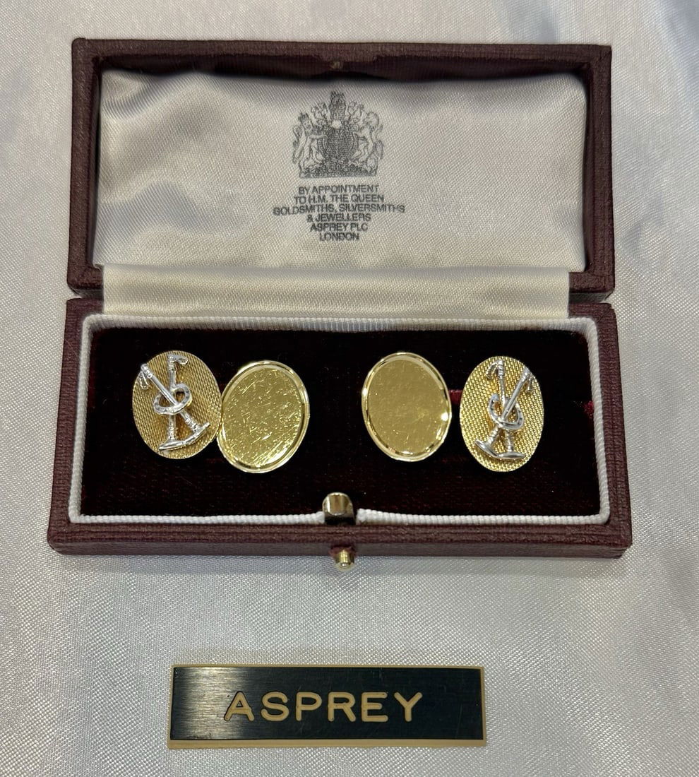 Asprey 18K Gold Golf Cufflinks with Original Box: Asprey 18K Gold Golf Cufflinks with Original Box This exquisite pair of golf cufflinks is crafted by Asprey, showcasing a stunning combination of 18k white and yellow gold. With a total weight of 12.5
