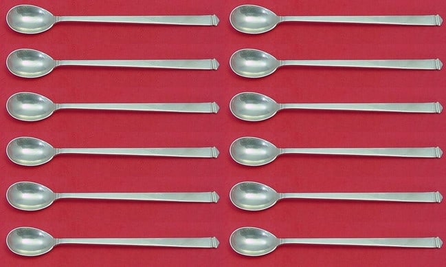 Tiffany & Co Hampton Sterling Silver Iced Tea Spoon Set 12 pcs 7 5/8": Tiffany & Co Hampton Sterling Silver Iced Tea Spoon Set 12 pcs 7 5/8" Enhance your dining experience with this exquisite 12-piece iced tea spoon set from Tiffany & Co., featuring the elegant Hampton p