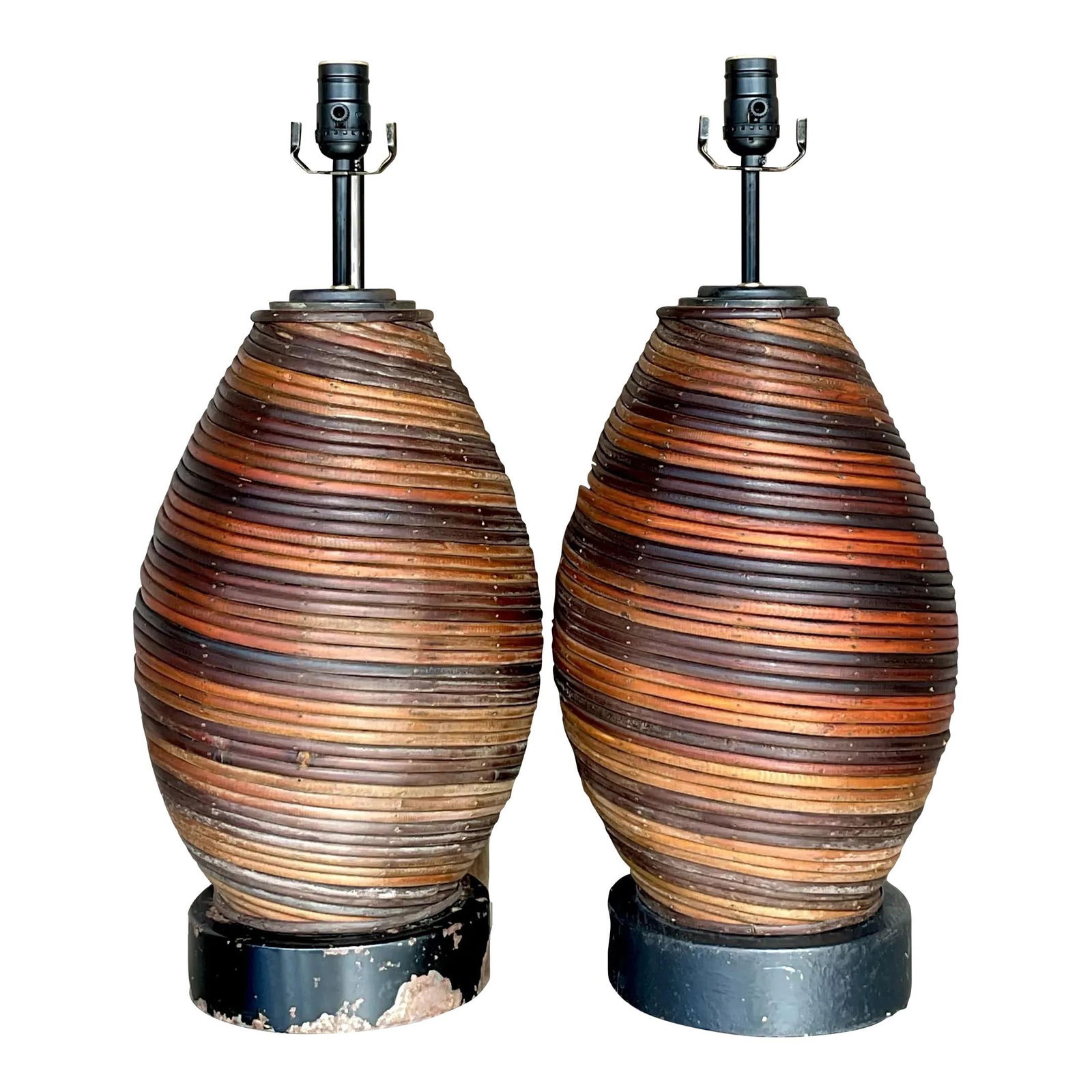 Pair of Vintage Boho Swirl Pencil Reed Lamps Sienna Color: Pair of Vintage Boho Swirl Pencil Reed Lamps Sienna Color Enhance your home decor with this exquisite pair of Vintage Boho Swirl Pencil Reed Lamps. Each lamp is meticulously crafted, showcasing a capt