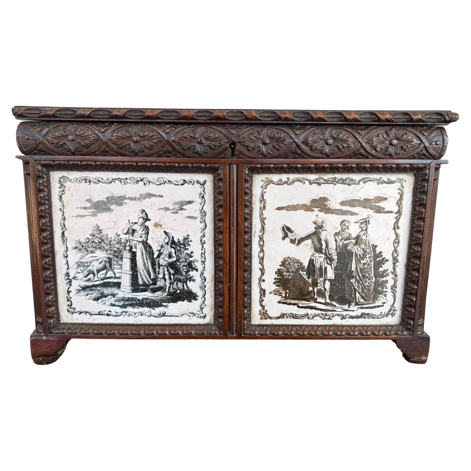 Rare 19th Century Anglo-Indian Hand Carved Tea Caddy with Delft Tile Inset: Rare 19th Century Anglo-Indian Hand Carved Tea Caddy with Delft Tile Inset Discover this exquisite 19th Century Anglo-Indian hand-carved tea caddy, a remarkable piece that showcases the craftsmanship