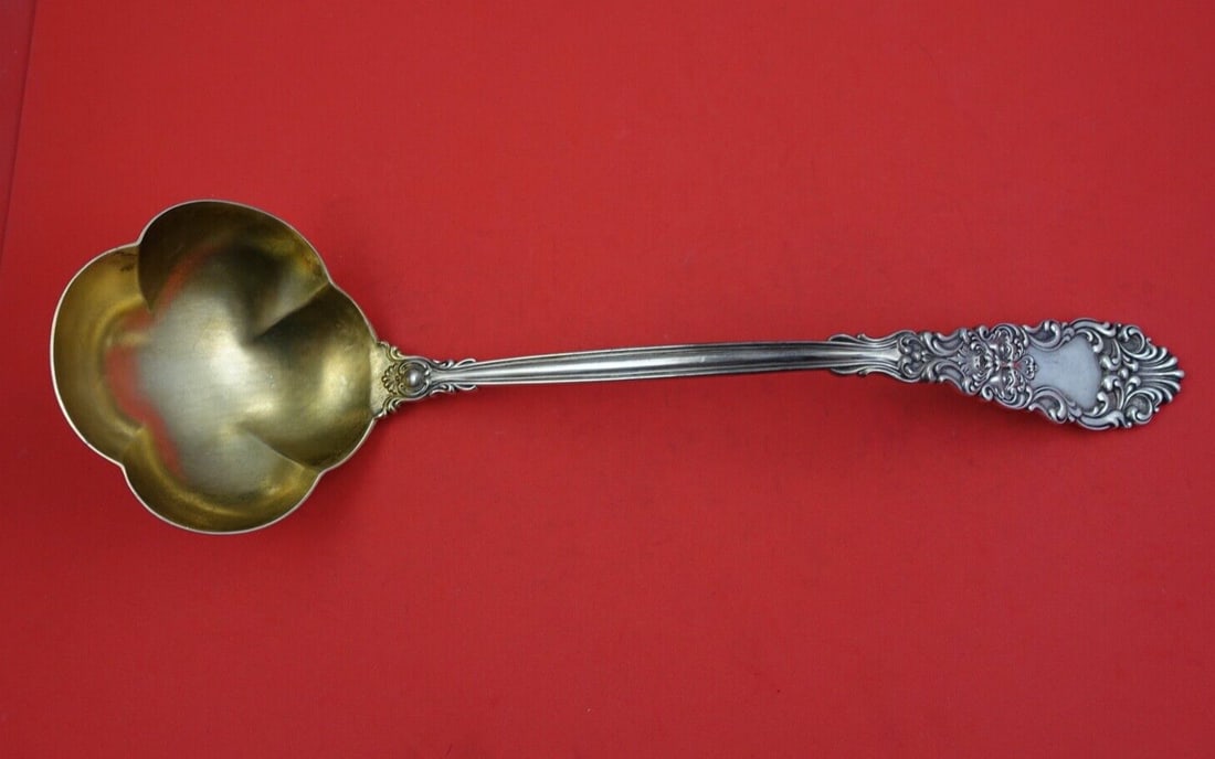 Dominick & Haff Renaissance Sterling Silver Gold Washed Soup Ladle 3 Lobed 13 3/4": Dominick & Haff Renaissance Sterling Silver Gold Washed Soup Ladle 3 Lobed 13 3/4" This exquisite soup ladle is crafted in sterling silver by Dominick & Haff, showcasing the elegant Renaissance patter