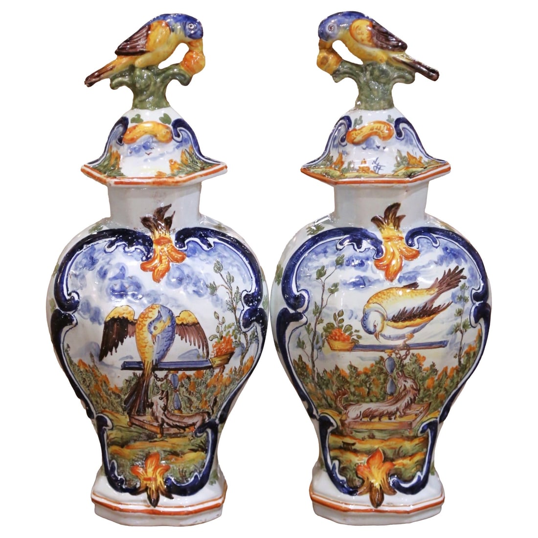 Set of 2 French Faience Decorative Bottles With Bird Finial Stoppers Circa 1860: Set of 2 French Faience Decorative Bottles With Bird Finial Stoppers Circa 1860 This pair of mid-19th century French faience bottles, crafted circa 1860, features baluster-shaped forms with richly han