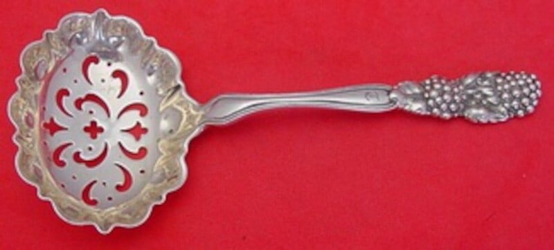 Tiffany & Co Blackberry Sterling Silver Sugar Sifter 5 3/4" Monogrammed: Tiffany & Co Blackberry Sterling Silver Sugar Sifter 5 3/4" Monogrammed This exquisite sterling silver sugar sifter, crafted by Tiffany & Co., features the elegant Blackberry pattern. Measuring 5 3/4