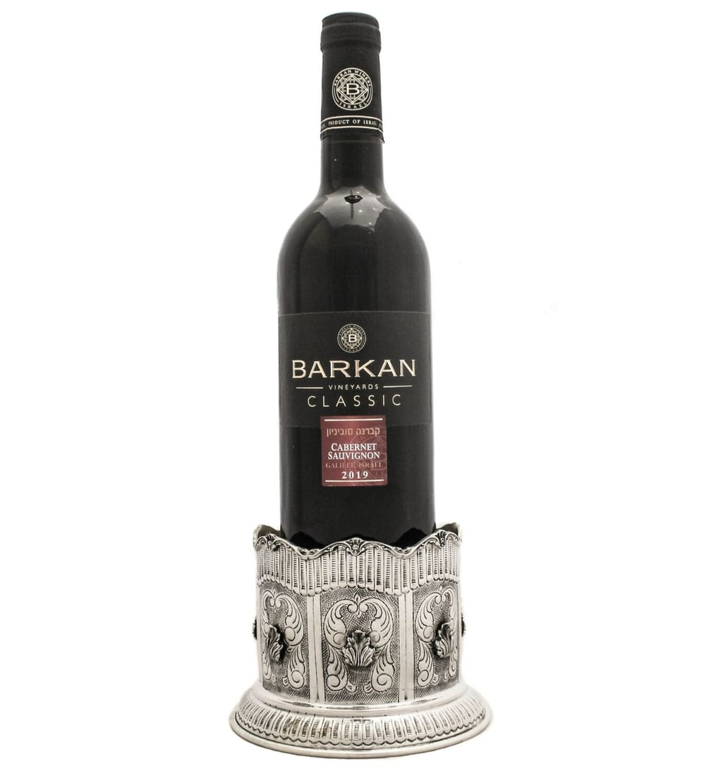 Handmade 925 Sterling Silver Floral Bottle Holder EAS-1504: Handmade 925 Sterling Silver Floral Bottle Holder EAS-1504 This exquisite bottle holder is crafted from fine 925 sterling silver, showcasing intricate handmade open chased leaf and floral designs. Wit