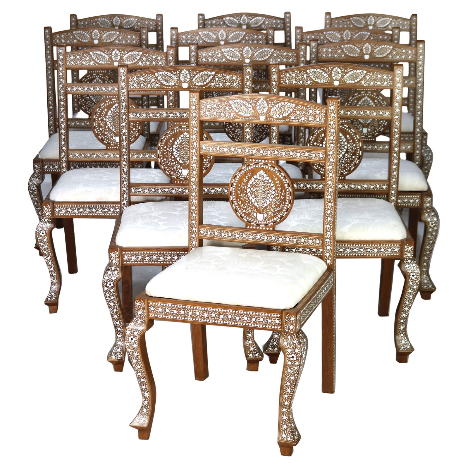 Set of 12 Moorish Inlaid Walnut Chairs with Elephant Motifs 20th Century: Set of 12 Moorish Inlaid Walnut Chairs with Elephant Motifs 20th Century Set of twelve antique chairs crafted in the Moorish style from walnut wood, featuring intricate inlay work with floral patterns