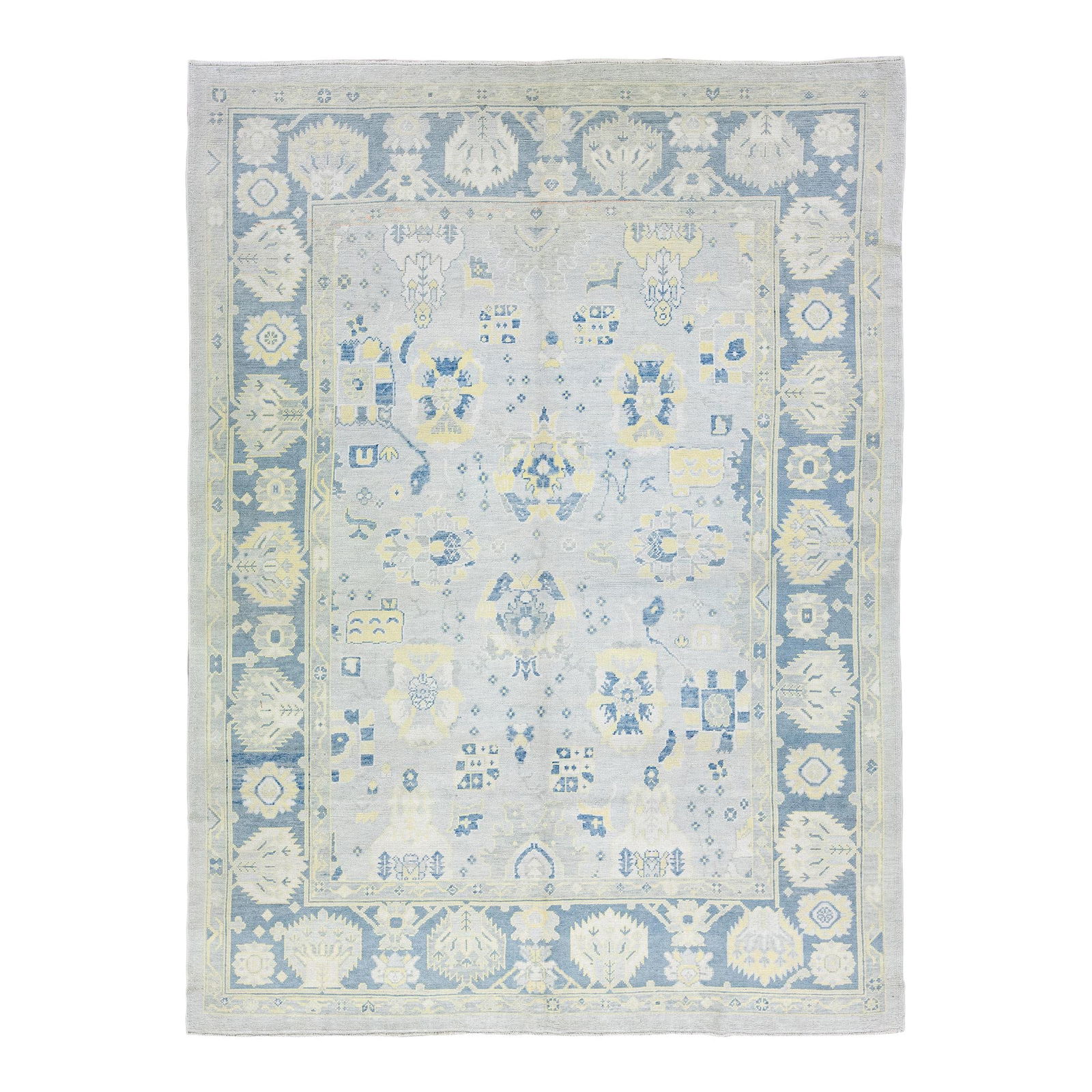 Gray Modern Oushak Handmade Wool Rug 9' x 12'4: Gray Modern Oushak Handmade Wool Rug 9' x 12'4 Enhance your living space with this stunning modern Oushak hand-knotted wool rug featuring a sophisticated gray field. Adorned with blue and yellow accen