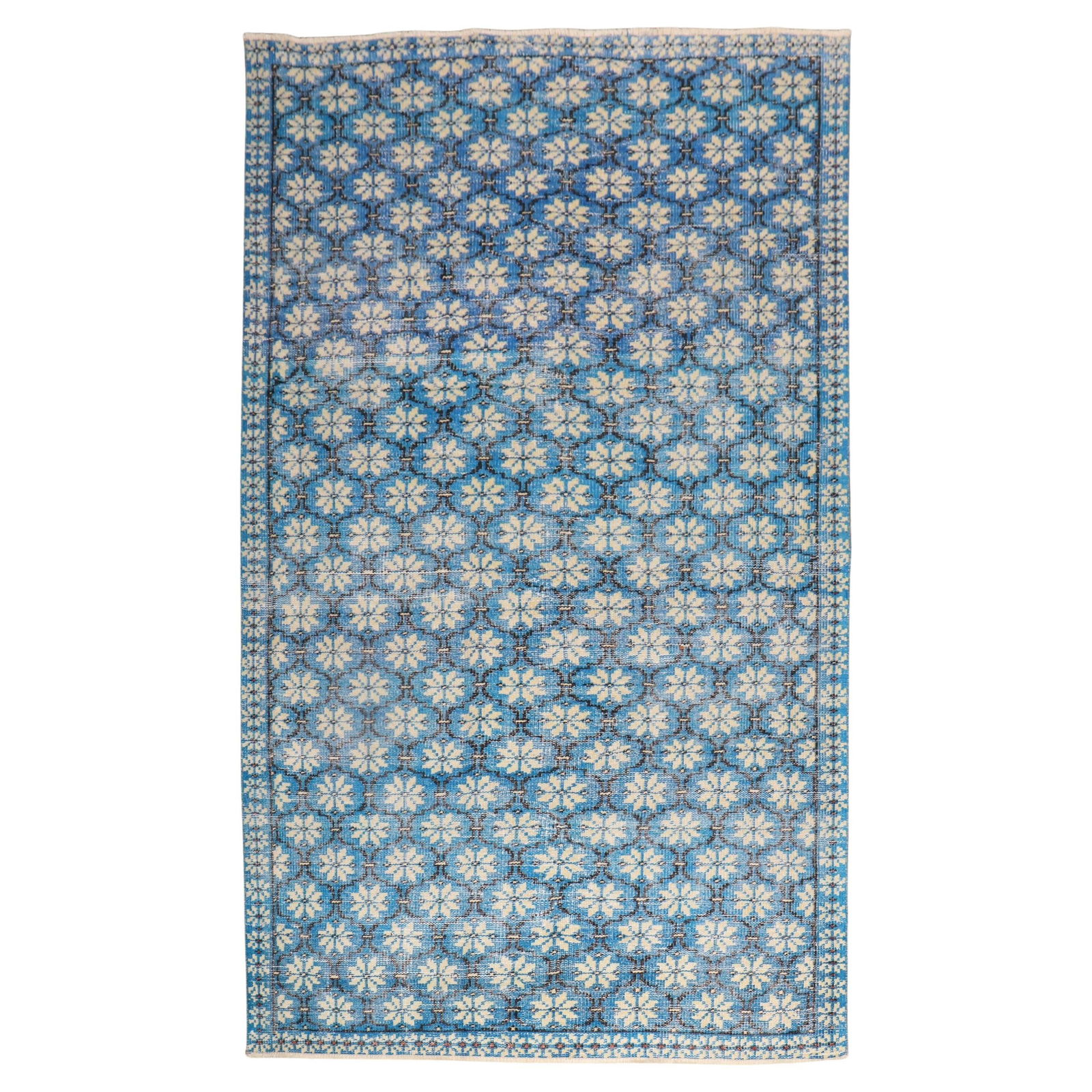 Mid-Century Turkish Hand-Woven Wool Rug in Vivid Blue 5'3" x 8'5": Mid-Century Turkish Hand-Woven Wool Rug in Vivid Blue 5'3" x 8'5" This vintage Turkish Deco rug from the mid-20th century showcases a vivid blue ground with a repetitive all-over design. Hand-woven fr