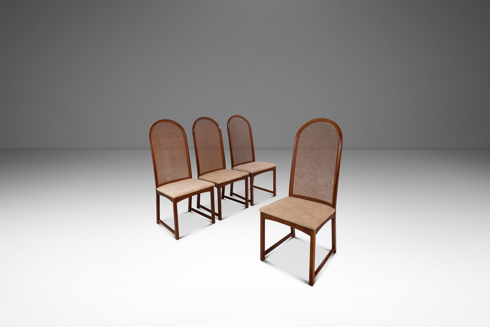 Set of 4 Milo Baughman Cane High-Back Walnut Dining Chairs for Directional 1950s: Set of 4 Milo Baughman Cane High-Back Walnut Dining Chairs for Directional 1950s This set of four high-back dining chairs, designed by Milo Baughman for Directional in the 1950s, features distinctive