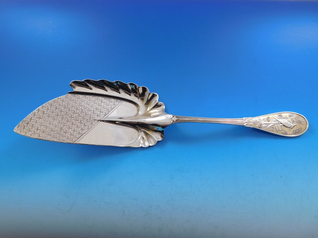 Tiffany & Co Japanese Sterling Silver Fish Server 11.5 Inch: Tiffany & Co Japanese Sterling Silver Fish Server 11.5 Inch This exquisite fish server from Tiffany & Co. features the distinctive Japanese pattern, showcasing a bright-cut geometric design on its bla