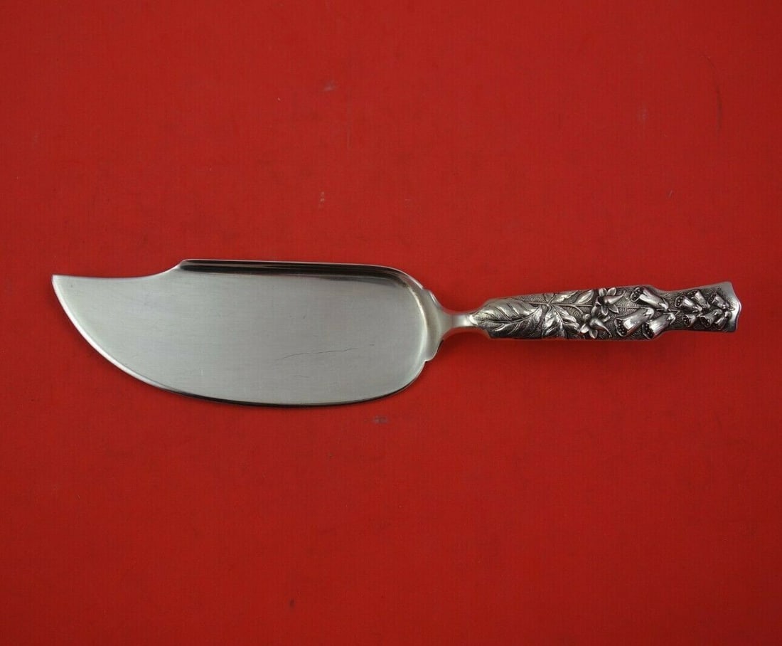 Shiebler Flora Sterling Silver Ice Cream Server 9 Inch Serving Piece: Shiebler Flora Sterling Silver Ice Cream Server 9 Inch Serving Piece This exquisite ice cream server from the Flora pattern by Shiebler is crafted from high-quality sterling silver, showcasing a stunn
