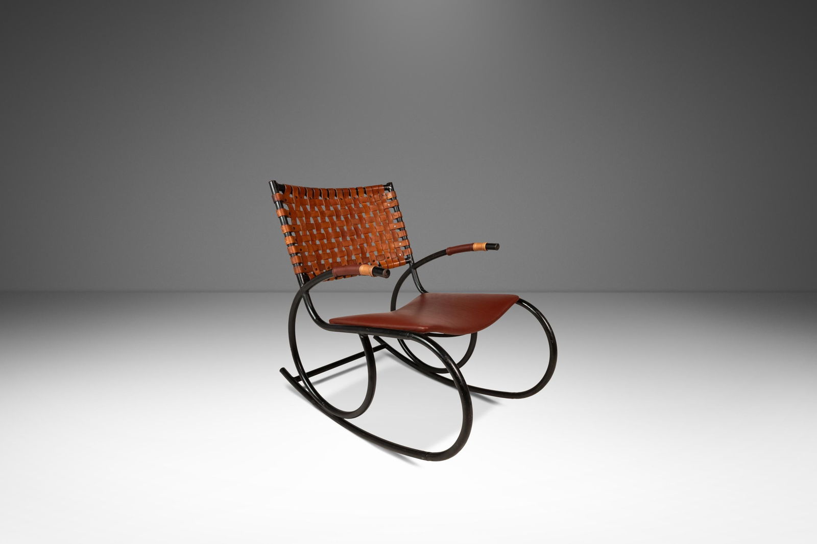 Unique Mid-Century Brutalist Rocking Chair in Italian Leather & Metal: Unique Mid-Century Brutalist Rocking Chair in Italian Leather & Metal Discover a unique Mid-Century Italian Modern Brutalist Industrial Tubular Rocking Chair, a stunning blend of leather and metal ins
