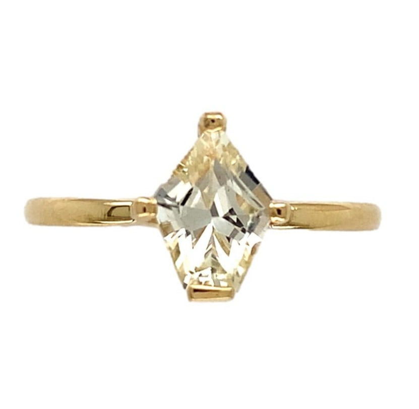 18k Yellow Gold Solitaire Ring 1.04ct Fancy Shield Yellow Sapphire Certified: 18k Yellow Gold Solitaire Ring 1.04ct Fancy Shield Yellow Sapphire Certified This exquisite 18k yellow gold solitaire ring features a stunning 1.04 ct fancy shield-shaped yellow sapphire. The pale yel