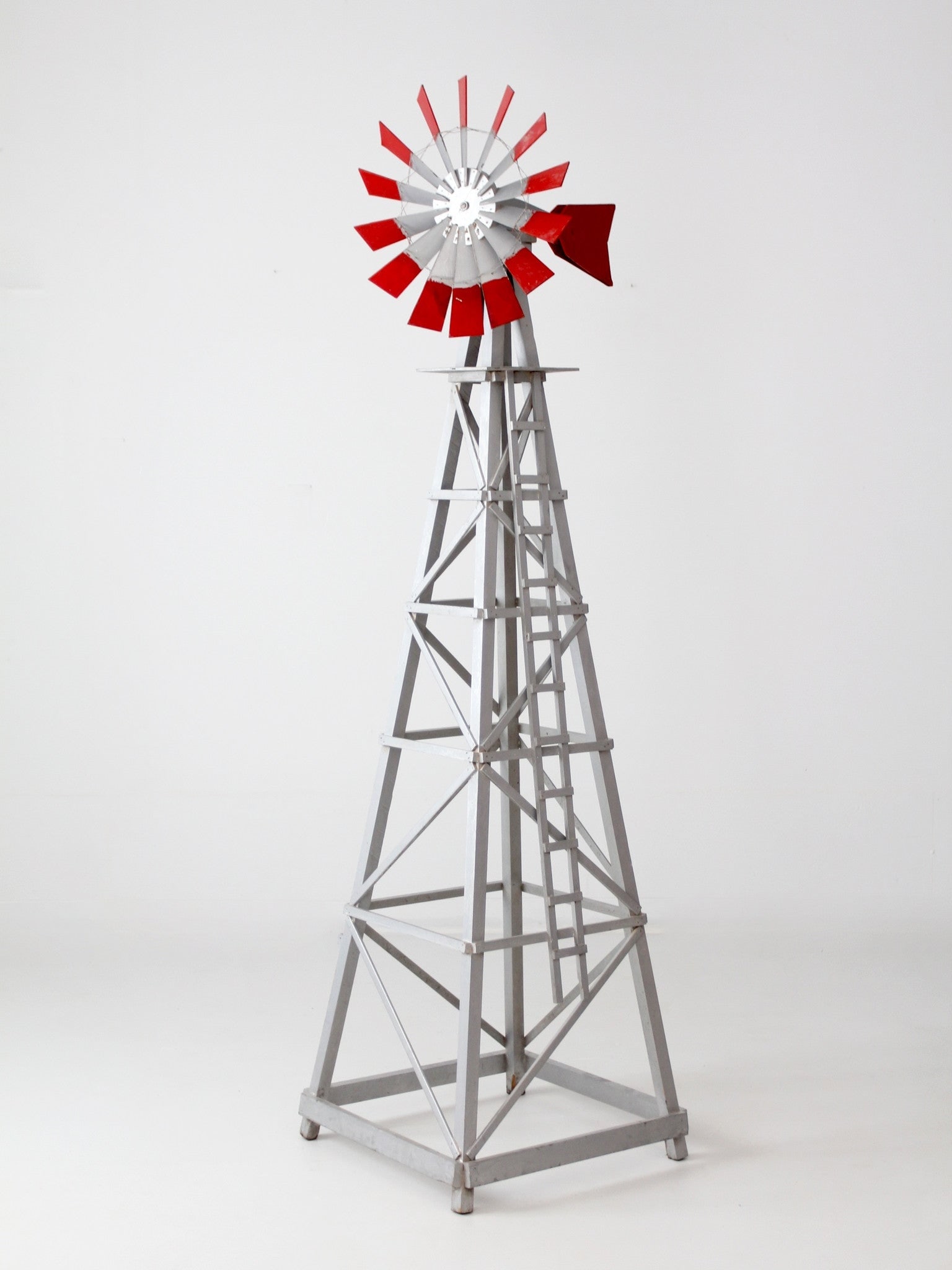 Mid Century Painted Wooden Windmill Outdoor Garden Statement Sculpture 83 Inch Tall: Mid Century Painted Wooden Windmill Outdoor Garden Statement Sculpture 83 Inch Tall This large vintage wood windmill, dating to the mid-20th century, features a painted tower that stands nearly seven
