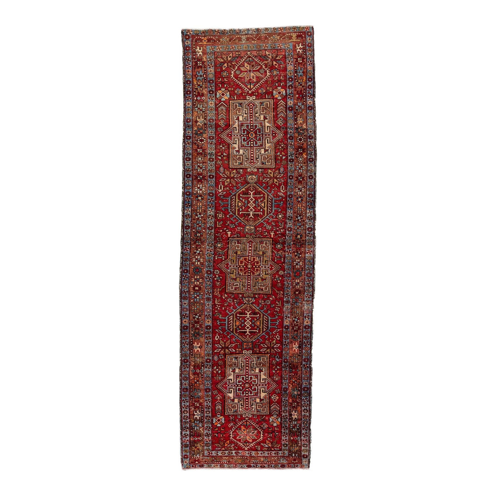 Vintage Persian Heriz Red Wool Runner Hand-Knotted Medallion 3'4" x 10'9": Vintage Persian Heriz Red Wool Runner Hand-Knotted Medallion 3'4" x 10'9" This exquisite vintage Persian Heriz runner showcases a stunning hand-knotted wool construction, featuring a vibrant red color
