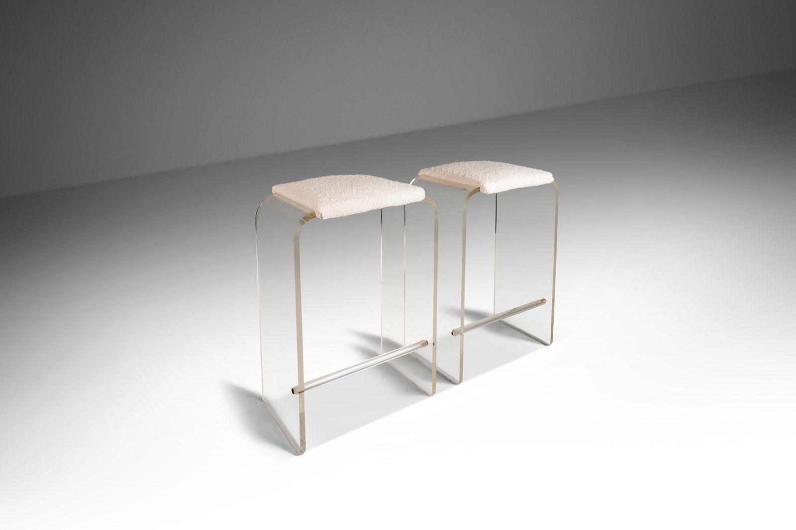 Set of 2 Hollywood Regency Waterfall Lucite Barstools by Charles Hollis Jones: Set of 2 Hollywood Regency Waterfall Lucite Barstools by Charles Hollis Jones This exquisite set of two waterfall-shaped bar height stools embodies the elegance and allure of Hollywood Regency style.