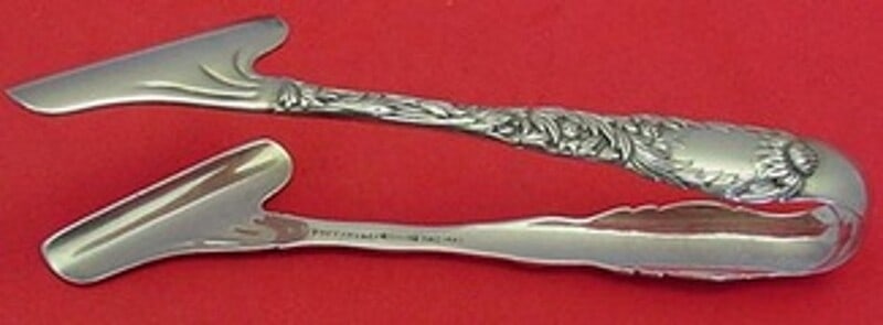 Tiffany & Co Chrysanthemum Sterling Silver Asparagus Tong 5 Inch: Tiffany & Co Chrysanthemum Sterling Silver Asparagus Tong 5 Inch This exquisite asparagus tong is crafted from sterling silver and features the elegant Chrysanthemum pattern by Tiffany & Co. Measuring