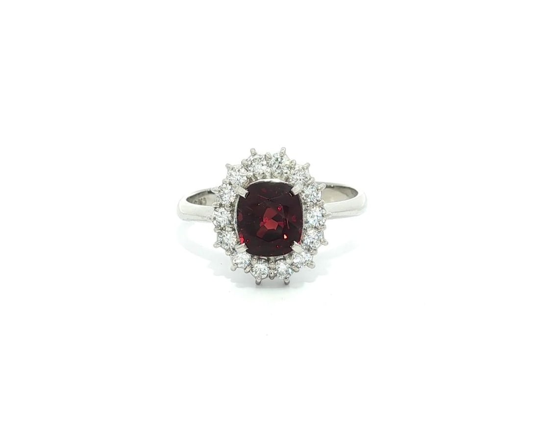 Platinum GIA 2.69ctw No Heat Deep Red Spinel Diamond Halo Ring: Platinum GIA 2.69ctw No Heat Deep Red Spinel Diamond Halo Ring This exquisite cocktail ring features a stunning natural cushion-cut spinel, showcasing a deep red color without any heat treatment. The