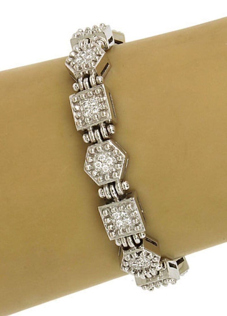 Diamond Octagon Square Link Bracelet in 18k White Gold by Ivan & Co.: Diamond Octagon Square Link Bracelet in 18k White Gold by Ivan & Co. This vintage octagon and square link bracelet is expertly crafted from solid 18k white gold, showcasing refined Italian design. The