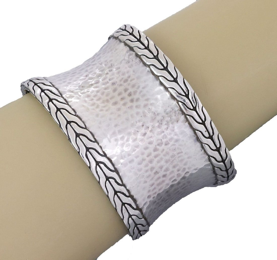 Sterling Silver Wide Cuff Bracelet from John Hardy Palu Collection: Sterling Silver Wide Cuff Bracelet from John Hardy Palu Collection This John Hardy Palu hammered wide cuff bracelet is crafted from solid sterling silver and features the signature Palu hammered finis