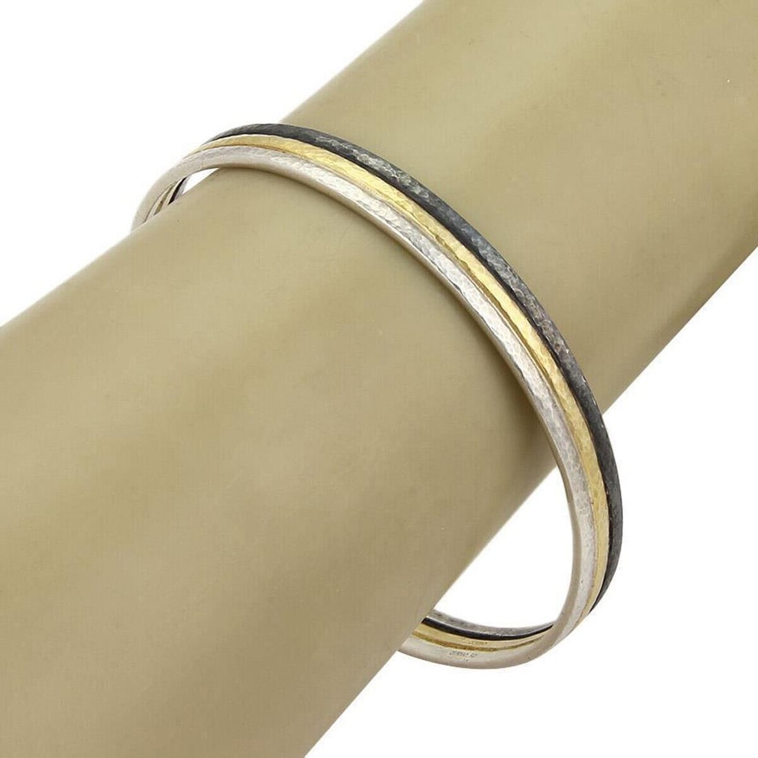 Sterling Silver 24k Gold Overlay Bangle by Gurhan Skittle Collection: Sterling Silver 24k Gold Overlay Bangle by Gurhan Skittle Collection This Gurhan Skittle bangle bracelet is crafted from sterling silver with a 24k gold overlay, offering a sophisticated, stone-free d