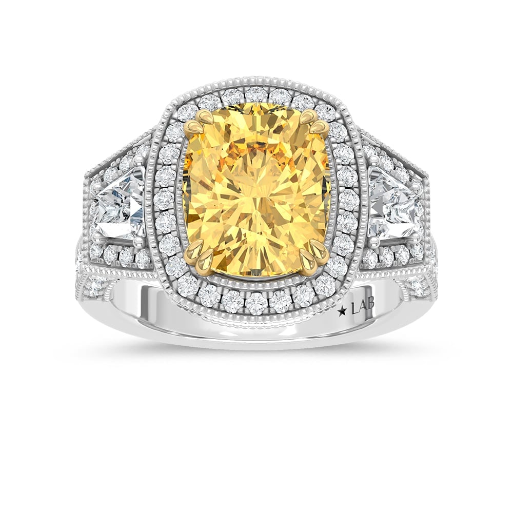 14K Two Tone Lab Grown Diamond 6 1/2 Ct.Tw. Yellow Cushion Engagement Ring (Center 5ct): 14K Two Tone Lab Grown Diamond 6 1/2 Ct.Tw. Yellow Cushion Engagement Ring (Center 5ct) Celebrate bold elegance with this 14K Two-Tone Gold Engagement Ring, featuring a stunning 5-carat lab-grown cush
