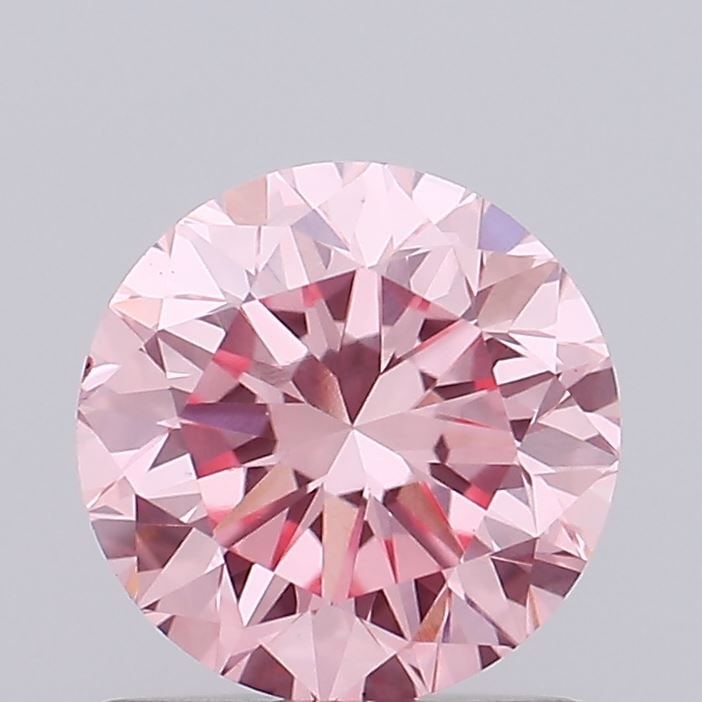 Loose Diamond - ROUND 0.85ct Fancy Vivid Pink VS1: Loose Diamond - ROUND 0.85ct Fancy Vivid Pink VS1 Source: This is a real non-mined Diamond that has been grown in a lab Shape: ROUND Carats: 0.85 Color: Fancy Vivid Pink Certification: IGI Video: