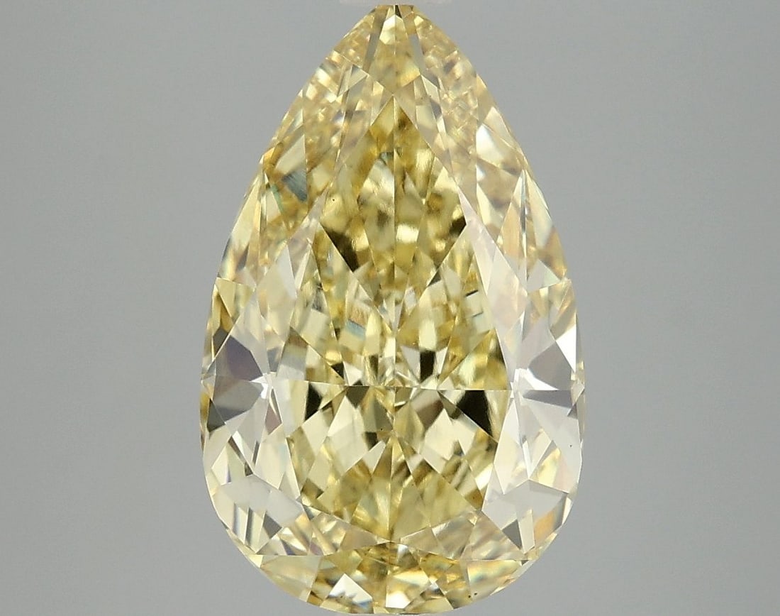 Loose Diamond - PEAR 5.08ct Fancy Vivid Yellow VS2: Loose Diamond - PEAR 5.08ct Fancy Vivid Yellow VS2 Source: This is a real non-mined Diamond that has been grown in a lab Shape: PEAR Carats: 5.08 Color: Fancy Vivid Yellow Certification: IGI Video: