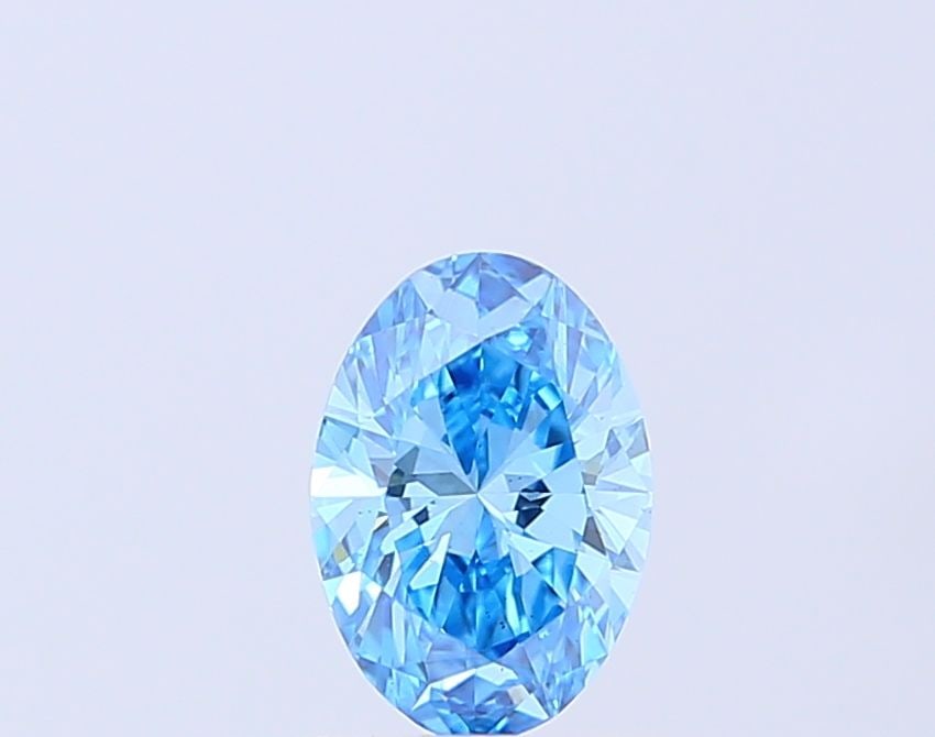 Loose Diamond - OVAL 0.93ct Fancy Vivid Blue VS2: Loose Diamond - OVAL 0.93ct Fancy Vivid Blue VS2 Source: This is a real non-mined Diamond that has been grown in a lab Shape: OVAL Carats: 0.93 Color: Fancy Vivid Blue Certification: IGI Video: