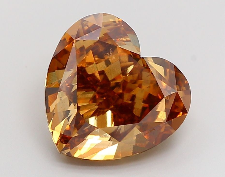 Loose Diamond - HEART 10.11ct Fancy Vivid Brown Yellow VS2: Loose Diamond - HEART 10.11ct Fancy Vivid Brown Yellow VS2 Source: This is a real non-mined Diamond that has been grown in a lab Shape: HEART Carats: 10.11 Color: Fancy Vivid Brown Yellow
