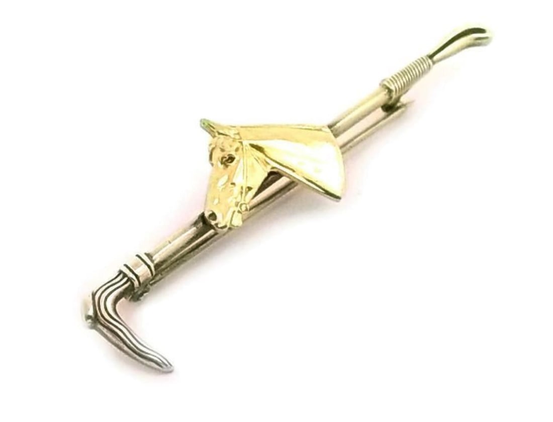 Vintage 10k Yellow Gold Horse Motif Tie Pin: Vintage 10k Yellow Gold Horse Motif Tie Pin This vintage tie pin features a detailed horse motif crafted in 10k yellow gold. Its unique design and fine craftsmanship make it an elegant accessory for a