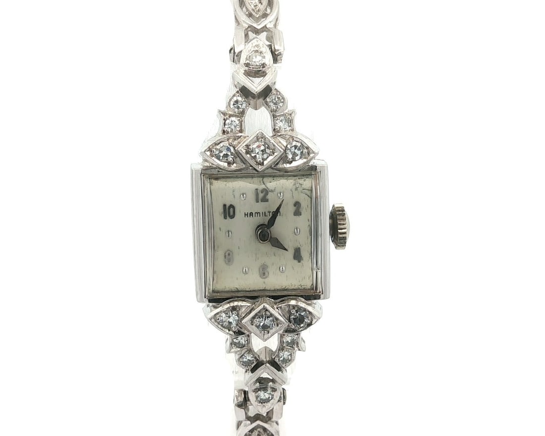 Hamilton Vintage Platinum & 14k White Gold Diamond Link Bracelet 0.45ctw: Hamilton Vintage Platinum & 14k White Gold Diamond Link Bracelet 0.45ctw This vintage Hamilton wristwatch features a stunning blend of platinum and 14k white gold craftsmanship, adorned with approxima